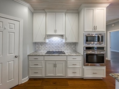 4524 Orchard Knoll Circle is beautifully tucked away at the end on Stone Creek Golf Club in Georgia - for sale on GolfHomes.com, golf home, golf lot