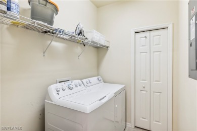 PRICE REDUCTION! LOOKING FOR A SPACIOUS CONDO WITH A GARAGE? YOU on River Hall Country Club in Florida - for sale on GolfHomes.com, golf home, golf lot