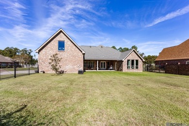 Welcome Home! Situated on a corner lot in the Prestigious Carter on Carter Plantation Golf Course in Louisiana - for sale on GolfHomes.com, golf home, golf lot