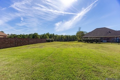 Welcome Home! Situated on a corner lot in the Prestigious Carter on Carter Plantation Golf Course in Louisiana - for sale on GolfHomes.com, golf home, golf lot
