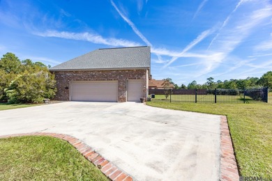 Welcome Home! Situated on a corner lot in the Prestigious Carter on Carter Plantation Golf Course in Louisiana - for sale on GolfHomes.com, golf home, golf lot