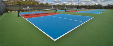 PRICE REDUCTION! LOOKING FOR A SPACIOUS CONDO WITH A GARAGE? YOU on River Hall Country Club in Florida - for sale on GolfHomes.com, golf home, golf lot
