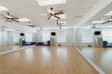 PRICE REDUCTION! LOOKING FOR A SPACIOUS CONDO WITH A GARAGE? YOU on River Hall Country Club in Florida - for sale on GolfHomes.com, golf home, golf lot