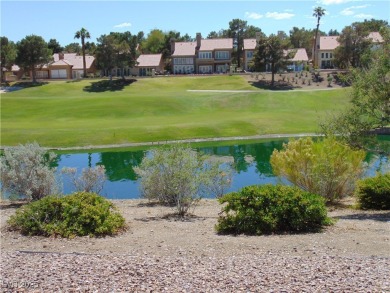 ONE OF THE BEST LOTS IN THE GARDENS.  LAKE, GOLF COURSE AND on Spanish Trail Golf and Country Club in Nevada - for sale on GolfHomes.com, golf home, golf lot