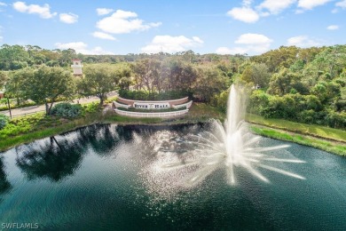 PRICE REDUCTION! LOOKING FOR A SPACIOUS CONDO WITH A GARAGE? YOU on River Hall Country Club in Florida - for sale on GolfHomes.com, golf home, golf lot