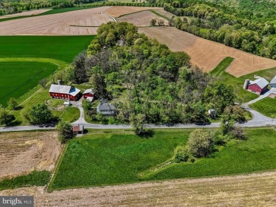 Located in the middle of rolling farm fields and amidst on Moccasin Run Golf Course in Pennsylvania - for sale on GolfHomes.com, golf home, golf lot
