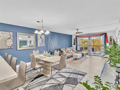 This beautifully remodeled 2/2 second floor unit has a gorgeous on Flamingo Lakes Country Club in Florida - for sale on GolfHomes.com, golf home, golf lot