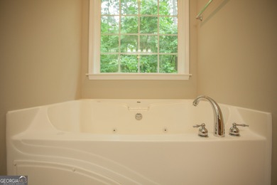 Immaculate ranch-style home in gated Fairfield Plantation! This on Fairfield Plantation Golf and Country Club in Georgia - for sale on GolfHomes.com, golf home, golf lot