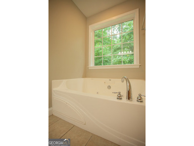 Immaculate ranch-style home in gated Fairfield Plantation! This on Fairfield Plantation Golf and Country Club in Georgia - for sale on GolfHomes.com, golf home, golf lot