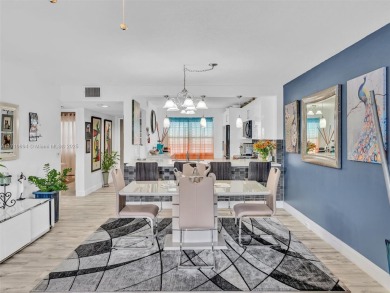 This beautifully remodeled 2/2 second floor unit has a gorgeous on Flamingo Lakes Country Club in Florida - for sale on GolfHomes.com, golf home, golf lot