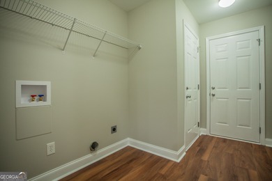 Immaculate ranch-style home in gated Fairfield Plantation! This on Fairfield Plantation Golf and Country Club in Georgia - for sale on GolfHomes.com, golf home, golf lot