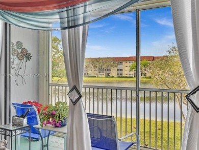 This beautifully remodeled 2/2 second floor unit has a gorgeous on Flamingo Lakes Country Club in Florida - for sale on GolfHomes.com, golf home, golf lot