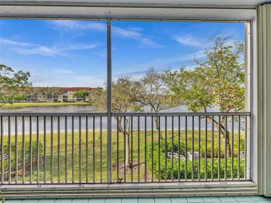 This beautifully remodeled 2/2 second floor unit has a gorgeous on Flamingo Lakes Country Club in Florida - for sale on GolfHomes.com, golf home, golf lot