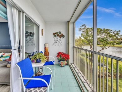 This beautifully remodeled 2/2 second floor unit has a gorgeous on Flamingo Lakes Country Club in Florida - for sale on GolfHomes.com, golf home, golf lot