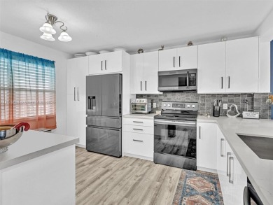 This beautifully remodeled 2/2 second floor unit has a gorgeous on Flamingo Lakes Country Club in Florida - for sale on GolfHomes.com, golf home, golf lot