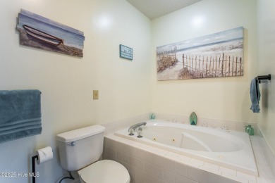 Convenience and serenity....that's what this sought after on Sound Golf Links at Albemarle Plantation in North Carolina - for sale on GolfHomes.com, golf home, golf lot
