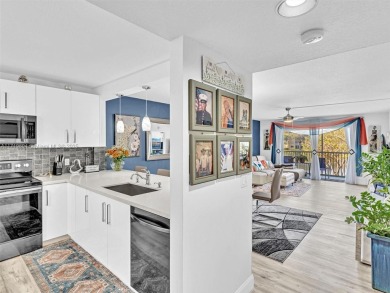 This beautifully remodeled 2/2 second floor unit has a gorgeous on Flamingo Lakes Country Club in Florida - for sale on GolfHomes.com, golf home, golf lot