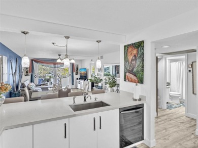 This beautifully remodeled 2/2 second floor unit has a gorgeous on Flamingo Lakes Country Club in Florida - for sale on GolfHomes.com, golf home, golf lot