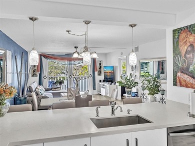 This beautifully remodeled 2/2 second floor unit has a gorgeous on Flamingo Lakes Country Club in Florida - for sale on GolfHomes.com, golf home, golf lot