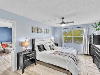 This beautifully remodeled 2/2 second floor unit has a gorgeous on Flamingo Lakes Country Club in Florida - for sale on GolfHomes.com, golf home, golf lot