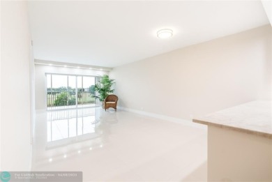 NOTHING HAS BEEN SPARED IN THIS BEAUTIFULLY FULLY RENOVATED AND on Palm-Aire Country Club and Resort - Palms in Florida - for sale on GolfHomes.com, golf home, golf lot