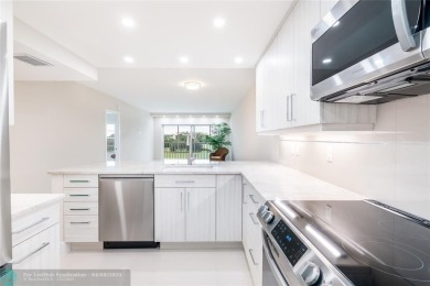 NOTHING HAS BEEN SPARED IN THIS BEAUTIFULLY FULLY RENOVATED AND on Palm-Aire Country Club and Resort - Palms in Florida - for sale on GolfHomes.com, golf home, golf lot