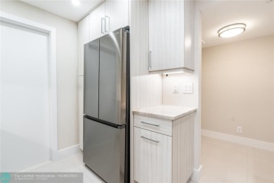 NOTHING HAS BEEN SPARED IN THIS BEAUTIFULLY FULLY RENOVATED AND on Palm-Aire Country Club and Resort - Palms in Florida - for sale on GolfHomes.com, golf home, golf lot