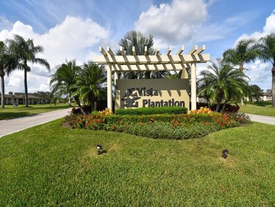 Enjoy beautiful LAKE and GOLF COURSE VIEWS from this desirable on Vista Plantation Golf Club in Florida - for sale on GolfHomes.com, golf home, golf lot