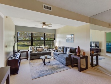 Enjoy beautiful LAKE and GOLF COURSE VIEWS from this desirable on Vista Plantation Golf Club in Florida - for sale on GolfHomes.com, golf home, golf lot