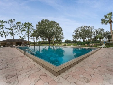 Under contract-accepting backup offers. This beautifully on Cypresswood Golf and Country Club in Florida - for sale on GolfHomes.com, golf home, golf lot