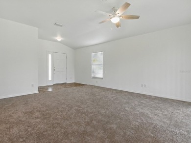 One or more photo(s) has been virtually staged. GREAT PRICE on on Eagle Ridge At Spruce Creek Country Club in Florida - for sale on GolfHomes.com, golf home, golf lot