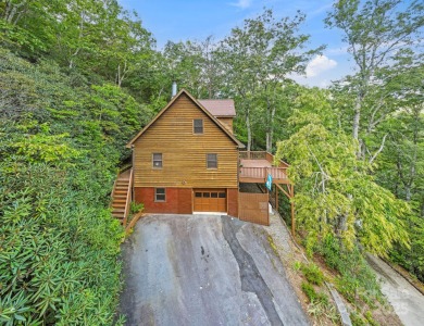 Nestled on a peaceful hilltop, this spacious 3-bedroom on Black Mountain Golf Course in North Carolina - for sale on GolfHomes.com, golf home, golf lot