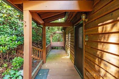 Nestled on a peaceful hilltop, this spacious 3-bedroom on Black Mountain Golf Course in North Carolina - for sale on GolfHomes.com, golf home, golf lot