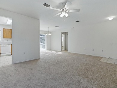 One or more photo(s) has been virtually staged. SELLER SAYS SELL on Eagle Ridge At Spruce Creek Country Club in Florida - for sale on GolfHomes.com, golf home, golf lot
