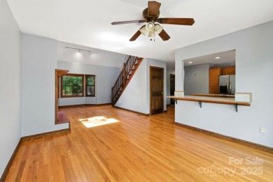 Nestled on a peaceful hilltop, this spacious 3-bedroom on Black Mountain Golf Course in North Carolina - for sale on GolfHomes.com, golf home, golf lot