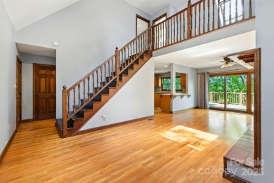 Nestled on a peaceful hilltop, this spacious 3-bedroom on Black Mountain Golf Course in North Carolina - for sale on GolfHomes.com, golf home, golf lot