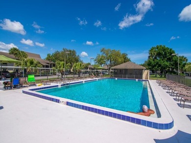 Enjoy beautiful LAKE and GOLF COURSE VIEWS from this desirable on Vista Plantation Golf Club in Florida - for sale on GolfHomes.com, golf home, golf lot