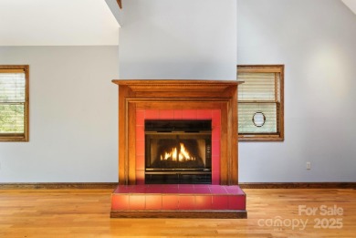 Nestled on a peaceful hilltop, this spacious 3-bedroom on Black Mountain Golf Course in North Carolina - for sale on GolfHomes.com, golf home, golf lot