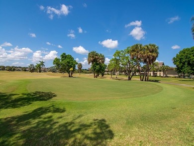 Enjoy beautiful LAKE and GOLF COURSE VIEWS from this desirable on Vista Plantation Golf Club in Florida - for sale on GolfHomes.com, golf home, golf lot