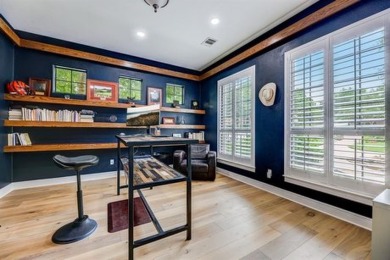 Discover refined elegance in this stunning two-story luxury home on University of Texas Golf Club in Texas - for sale on GolfHomes.com, golf home, golf lot