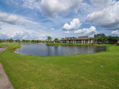 Enjoy beautiful LAKE and GOLF COURSE VIEWS from this desirable on Vista Plantation Golf Club in Florida - for sale on GolfHomes.com, golf home, golf lot