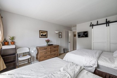 Nestled among peaceful pines, this fully furnished 3 bedroom, 2 on Pinetop Lakes Golf and Country Club in Arizona - for sale on GolfHomes.com, golf home, golf lot