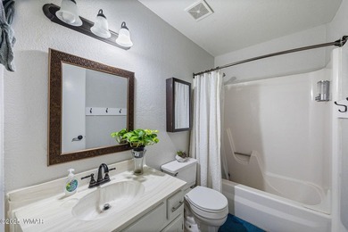 Nestled among peaceful pines, this fully furnished 3 bedroom, 2 on Pinetop Lakes Golf and Country Club in Arizona - for sale on GolfHomes.com, golf home, golf lot