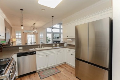 This bright and spacious condo offers stunning views of the on Riverfront Golf Club in Virginia - for sale on GolfHomes.com, golf home, golf lot