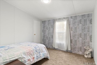 This freshly remodeled 3-bedroom, 2-bath doublewide is move-in on Tanglewood Shores Golf Club in Virginia - for sale on GolfHomes.com, golf home, golf lot