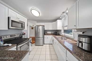Set on a lush, green lot in the heart of Baneberry, this warm on Baneberry Golf and Resort Club in Tennessee - for sale on GolfHomes.com, golf home, golf lot
