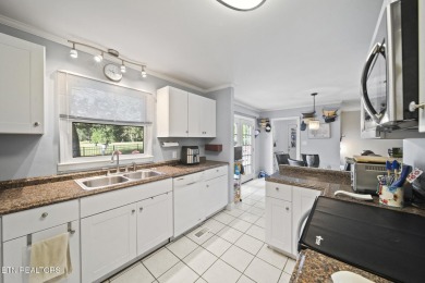 Set on a lush, green lot in the heart of Baneberry, this warm on Baneberry Golf and Resort Club in Tennessee - for sale on GolfHomes.com, golf home, golf lot
