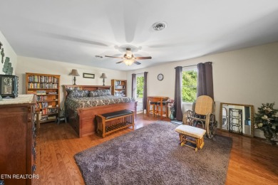 Set on a lush, green lot in the heart of Baneberry, this warm on Baneberry Golf and Resort Club in Tennessee - for sale on GolfHomes.com, golf home, golf lot