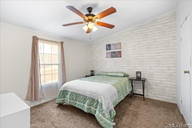 This freshly remodeled 3-bedroom, 2-bath doublewide is move-in on Tanglewood Shores Golf Club in Virginia - for sale on GolfHomes.com, golf home, golf lot
