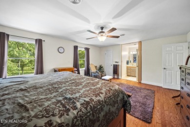 Set on a lush, green lot in the heart of Baneberry, this warm on Baneberry Golf and Resort Club in Tennessee - for sale on GolfHomes.com, golf home, golf lot
